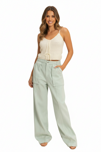 Model wearing mint green high rise cargo pants full face shot